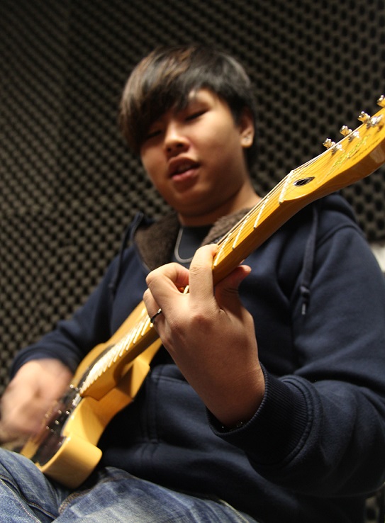 Baby has been learning to play the guitar in The Salvation Army for a year.