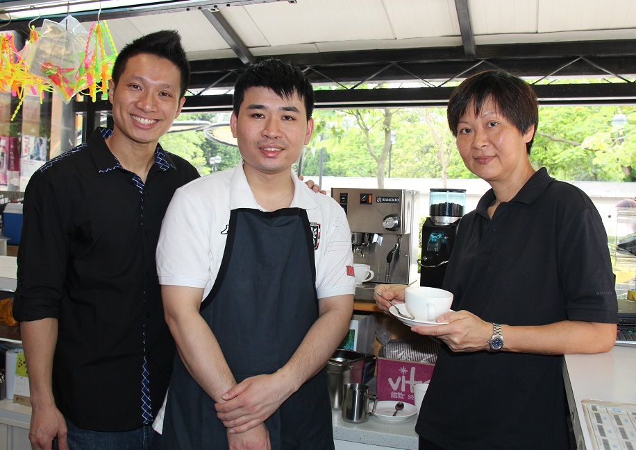 Tim (left) and Fanny (right), the Salvation Army tutors, support and encourage Kin to work towards his goal.