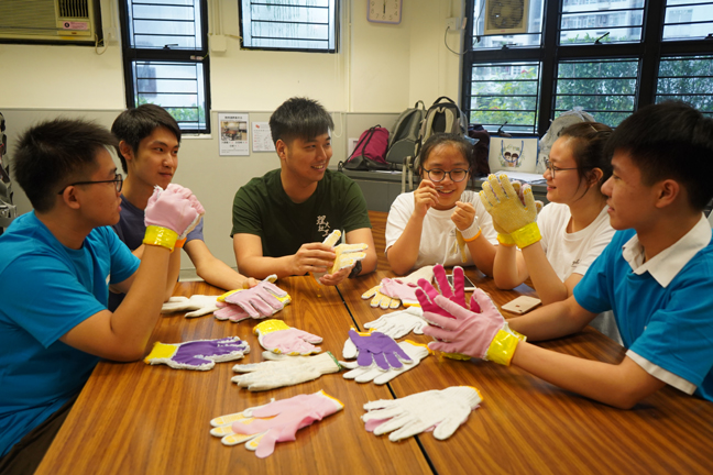 Lui Hok-chi, Salvation Army social worker (3rd left) likes to give young people questions to ponder as a process of self-exploration.