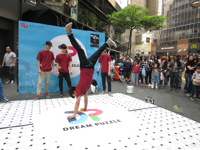 Nuclear Crew gave a street performance for The Salvation Army 'Dream Puzzle' project last year. Some children stepped forward and learnt some dance moves form the team.