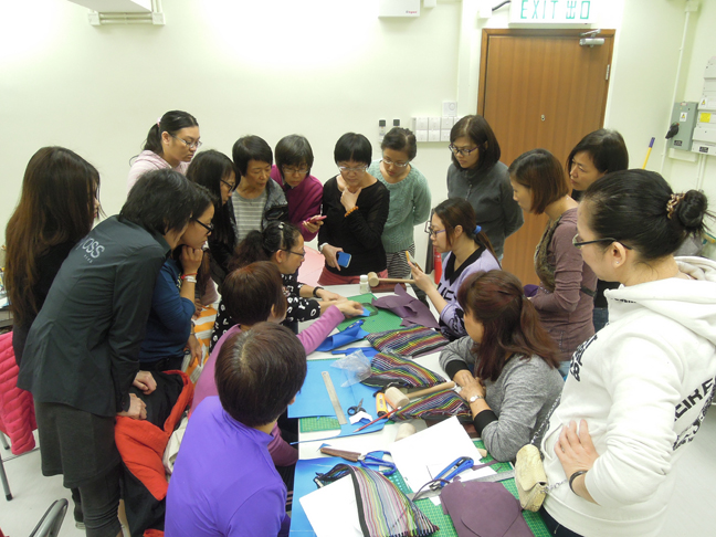 Rachel and other women learn leather-crafting skills.